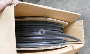 lot 86 image: New box of 38 hose 100 ft