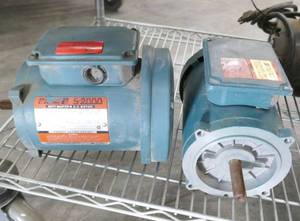 lot 107 image: Two Reliance Electric heavy duty 12hp motors