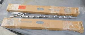 lot 121 image: Two New Thunderbird emblems