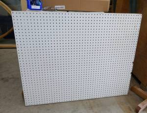 lot 143 image: Pegboard 36x46 with fold out legs in back so it can be propped up for display use