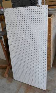 lot 144 image: Pegboard 24x48 with fold out legs in back so it can be propped up for display use, Plus a piece of unused pegboard