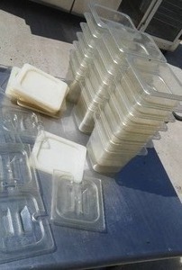 Polycarbonate food serving containers. Qty. - 21 with 14 covers.