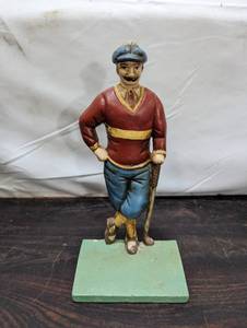 lot 61 image: Cast Metal Golfer Bookend