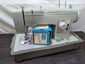 lot 74 image: Vintage Sears Portable Sewing Machine With Case