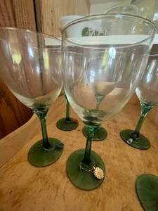 lot 86 image: Set of 6 decorative wine glasses with charms.