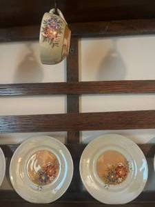 lot 140 image: Wooden Cup and Saucer Display and mini tea set