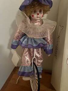 lot 164 image: Heritage Dolls Porcelain Clown on Unicycle