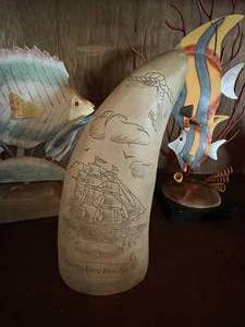 lot 180 image: Fish dcor and decorative whales tooth