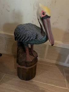 lot 185 image: Captain 18 tall and Pelican Statue 15 tall