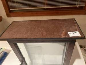lot 268 image: Small glass display case with two glass shelves, one shelf if missing, repairs needed. 13x6x18