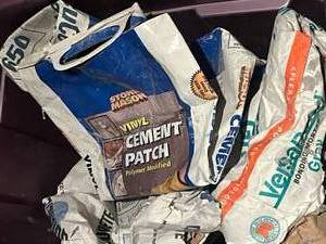 lot 397 image: Tote of grout and misc. painting supplies.