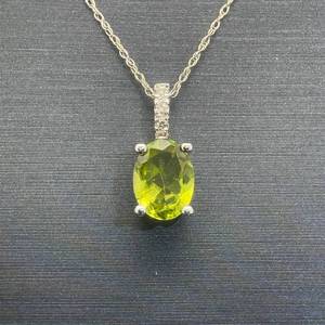 Oval Peridot Solitaire & Diamond Studded Bail Drop Pendant Necklace in White Gold
