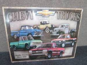lot 48 image: Metal Chevy Trucks Sign 16x12.5 inc...