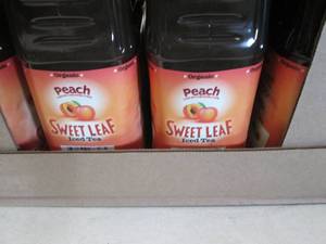 lot 244 image: 8- 64 oz Bottles Peach Sweet Leaf T...
