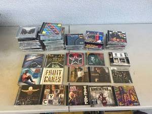 CDs - Jimmy Buffet, Garth Brooks, Lynyrd Skynyrd