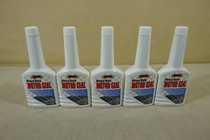 lot 198 image: 4 12oz Zecol Heavy Duty Motor Seal