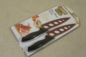 lot 109 image: Copper Knife Set