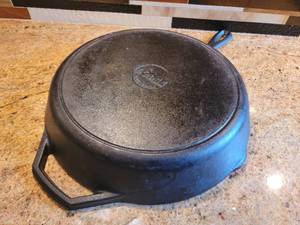 lot 65 image: Eight Inch Lodge Cast Iron pan