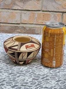 lot 19 image: Hopi Signed Polychrome Jar by Laura Silas