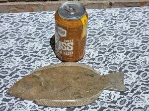lot 27 image: Coppermine Eskimo Carved Halibut by Kitigon