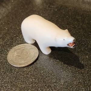 lot 34 image: Alaskan Carved Bone Polar Bear Figurine
