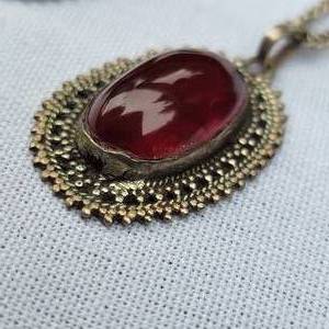 lot 67 image: Ox Blood Red Cabochon Pendant  Earrings  Ring Set