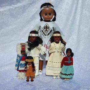 lot 103 image: Collection of 12 Souvenir Travel Indian Dols
