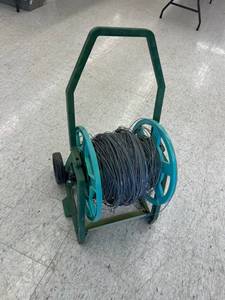 lot 212 image: Hose Reel with Fencing Wire