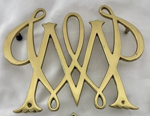 lot 124 image: Four Vintage Brass Trivets