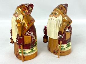 lot 78 image: Pair of Carved Handed Painted Russian Santa Figurines
