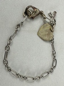 lot 119 image: Vintage Sterling Silver Heart Charm Bracelet