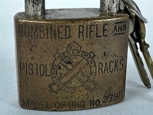 lot 112 image: Vintage Metal Rifle and Pistol Racks Padlock