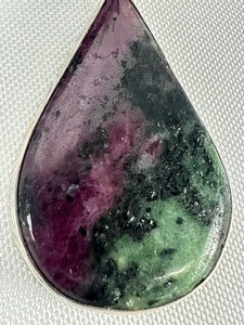 lot 210 image: Ruby Zoisite and Sterling Teardrop Shaped Pendant