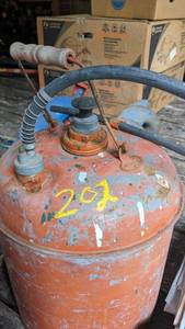 lot 202 image: Gas can with manual pump, 6 gallon