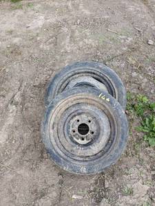 lot 166 image: Lot of 3-15 inch space saver spare tires with wheels