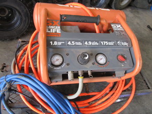 lot 18 image: Ridgid Portable Air Compressor
