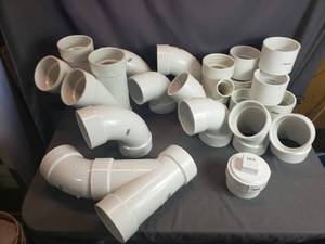 lot 48 image: Mostly 4 PVC Pipe Fittings