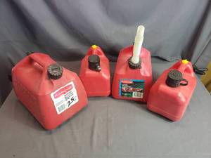 lot 55 image: 4 Smaller Gas Cans