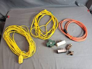 lot 64 image: Extension Cords and Multi-Plugs