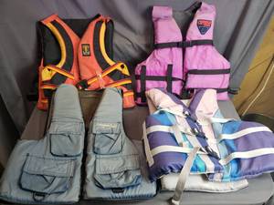 lot 69 image: Lot of 4 Life Jackets in Tote