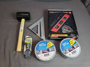 lot 89 image: Tools Duct Tape, Rubber Mallet, Clip Light, Square, Level, Screwdriver, Tape Measure