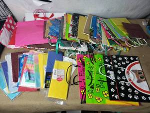 lot 138 image: 50 - Gift Bags and 25 - Colored Tissue Paper