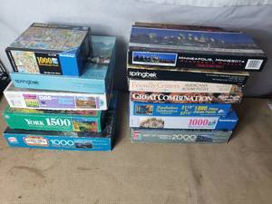 lot 140 image: 12 Different Puzzles, Ravensburger, Springbok and More