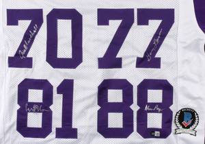 lot 18 image: Purple People Eaters Minnesota Vikings Pro Style Jersey Signed by (4) with Alan Page, Carl Eller, Jim Marshall, & Gary Larsen Beckett Authenticated
