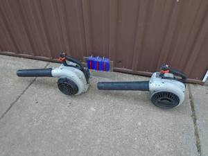 lot 111 image: Qty of 2 Echo leaf blowers. 1 works 1 for parts or repair.