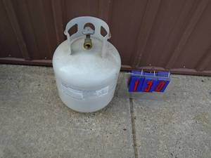 lot 130 image: 20 lb propane tank. As shown.