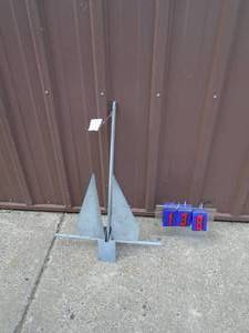 lot 138 image: 15 lb galvanized river anchor. Looks new. As shown.
