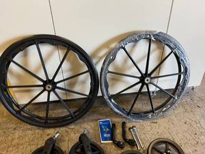 lot 49 image: Lot Of NEW Wheelchair Replacement Wheels & Parts