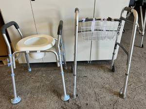 lot 61 image: PMI Probasics Dual Button Folding Walker with 5 Wheels and Commode Chair
