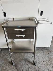 lot 70 image: MSRP $1200 Pedigo Stainless Steel Surgical Tools Table with 2 Drawers & Side Hangers  Great Condition